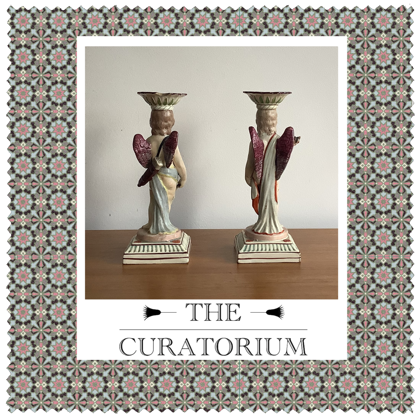 Pair of Staffordshire pearlware Cupid candlesticks, late 18th century