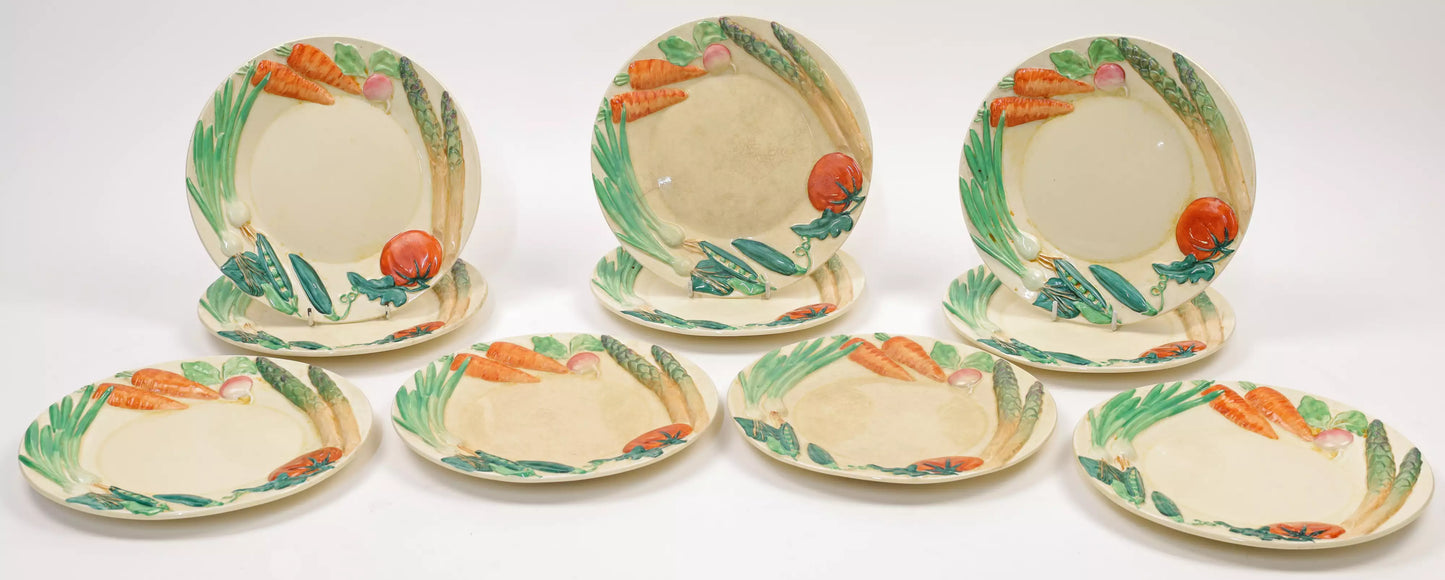 A set of ten ceramic Clarice Cliff plates, circa 1930