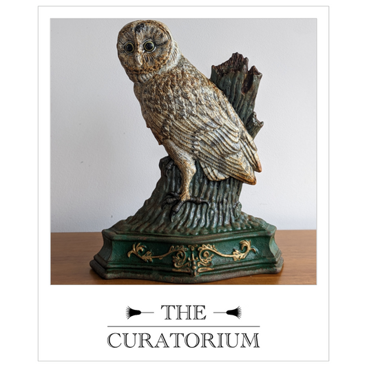 American cast iron door stopper in the form of an owl, early 20th century