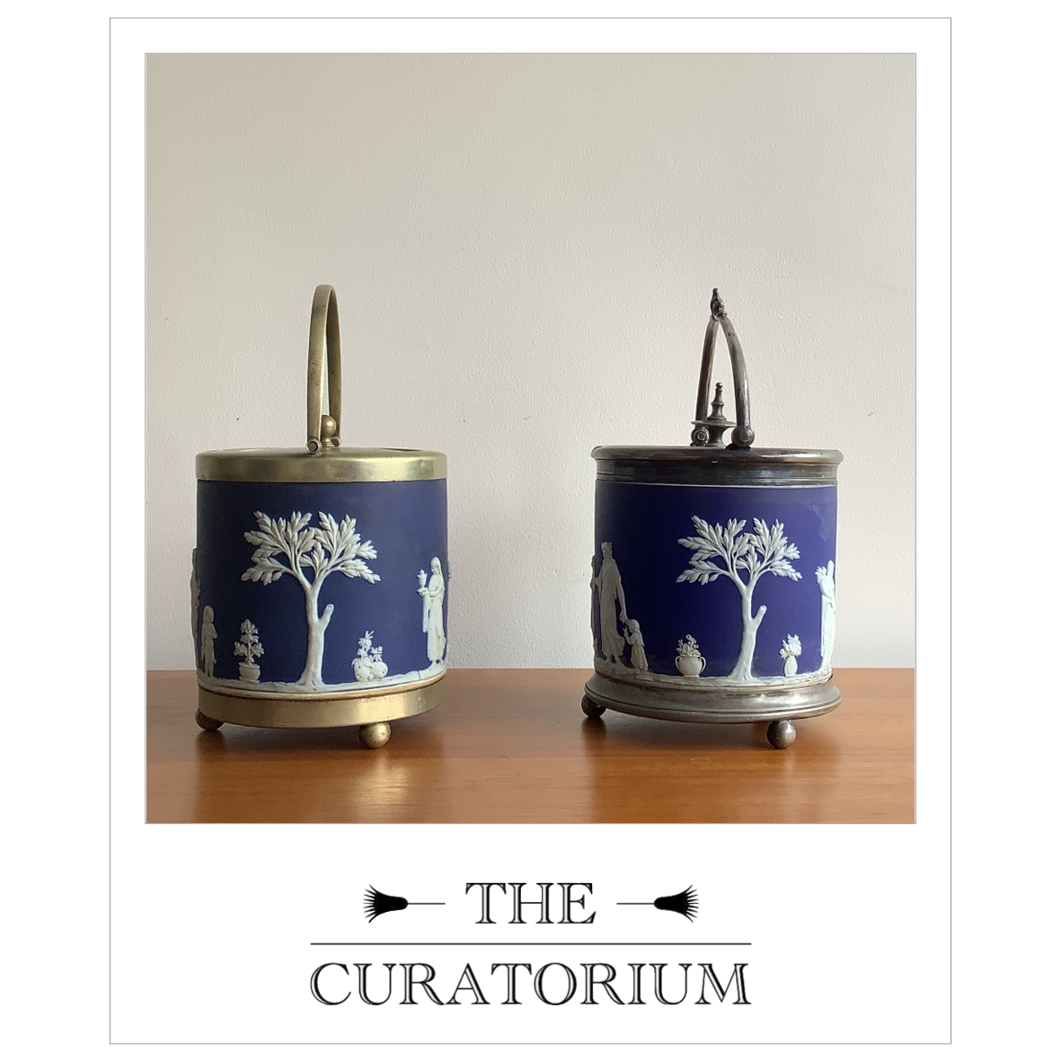 Two Wedgwood blue Jasperware biscuit barrels, circa 1930s