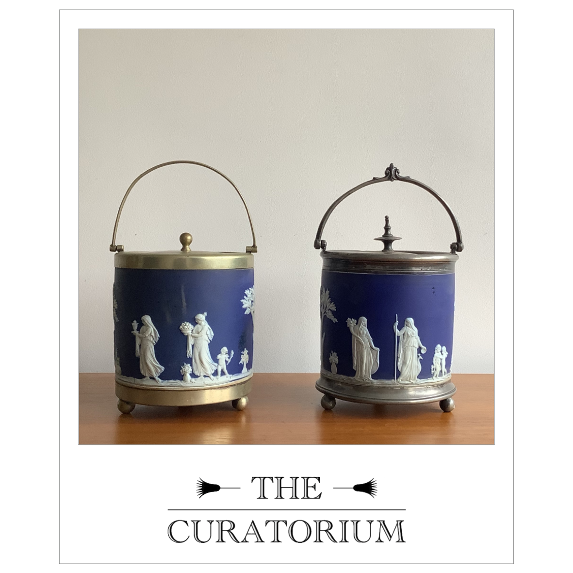 Two Wedgwood blue Jasperware biscuit barrels, circa 1930s