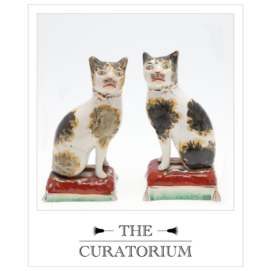 Pair of Staffordshire pottery cats, early 19th century
